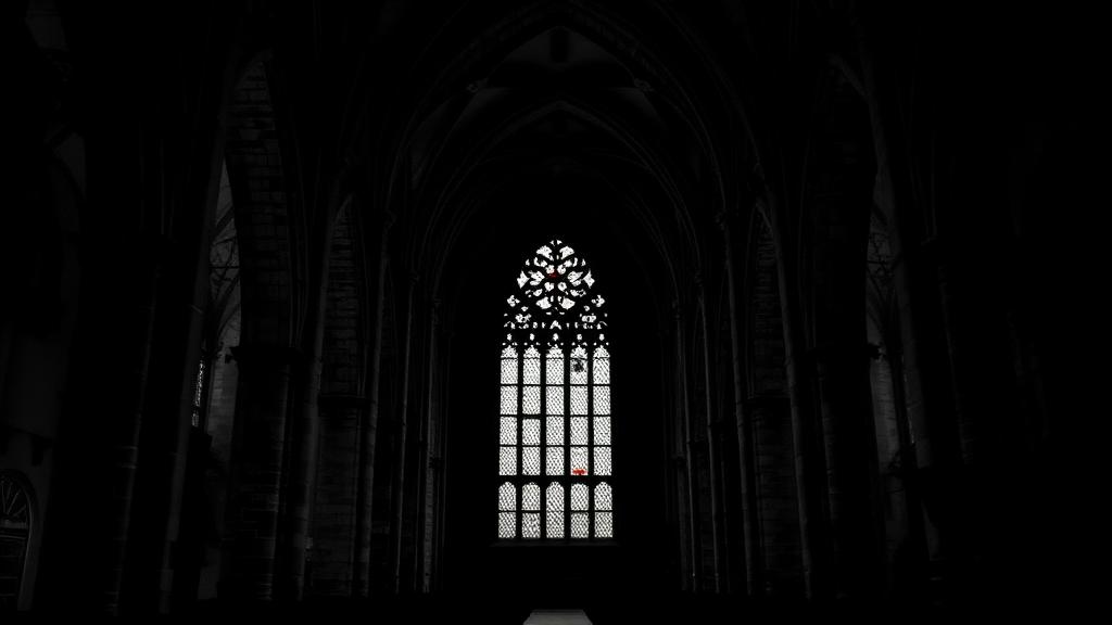 Dark black-and-white French cathedral interior